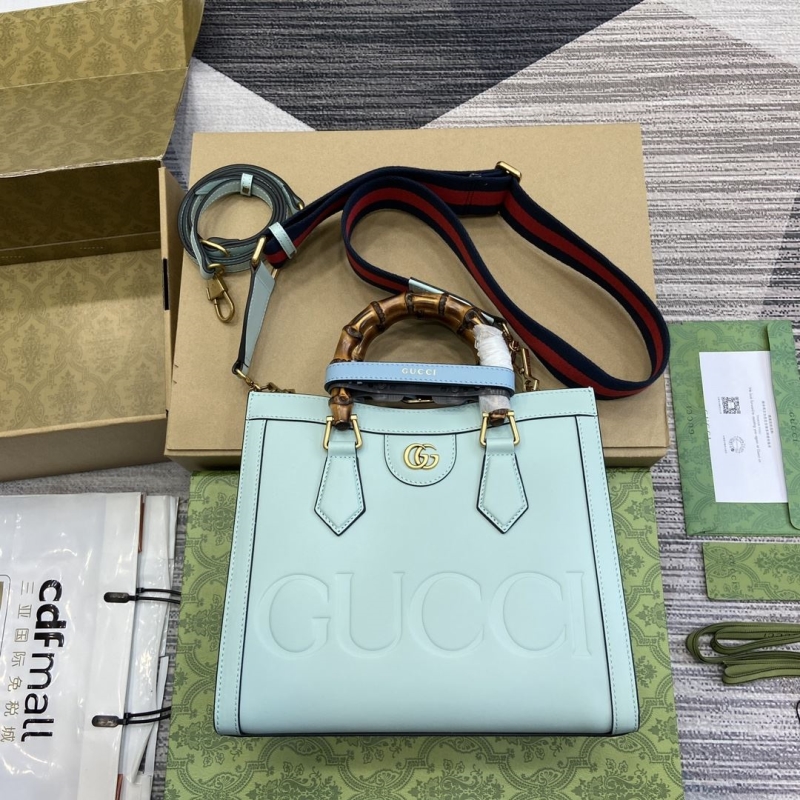 G*u*i top handle bags